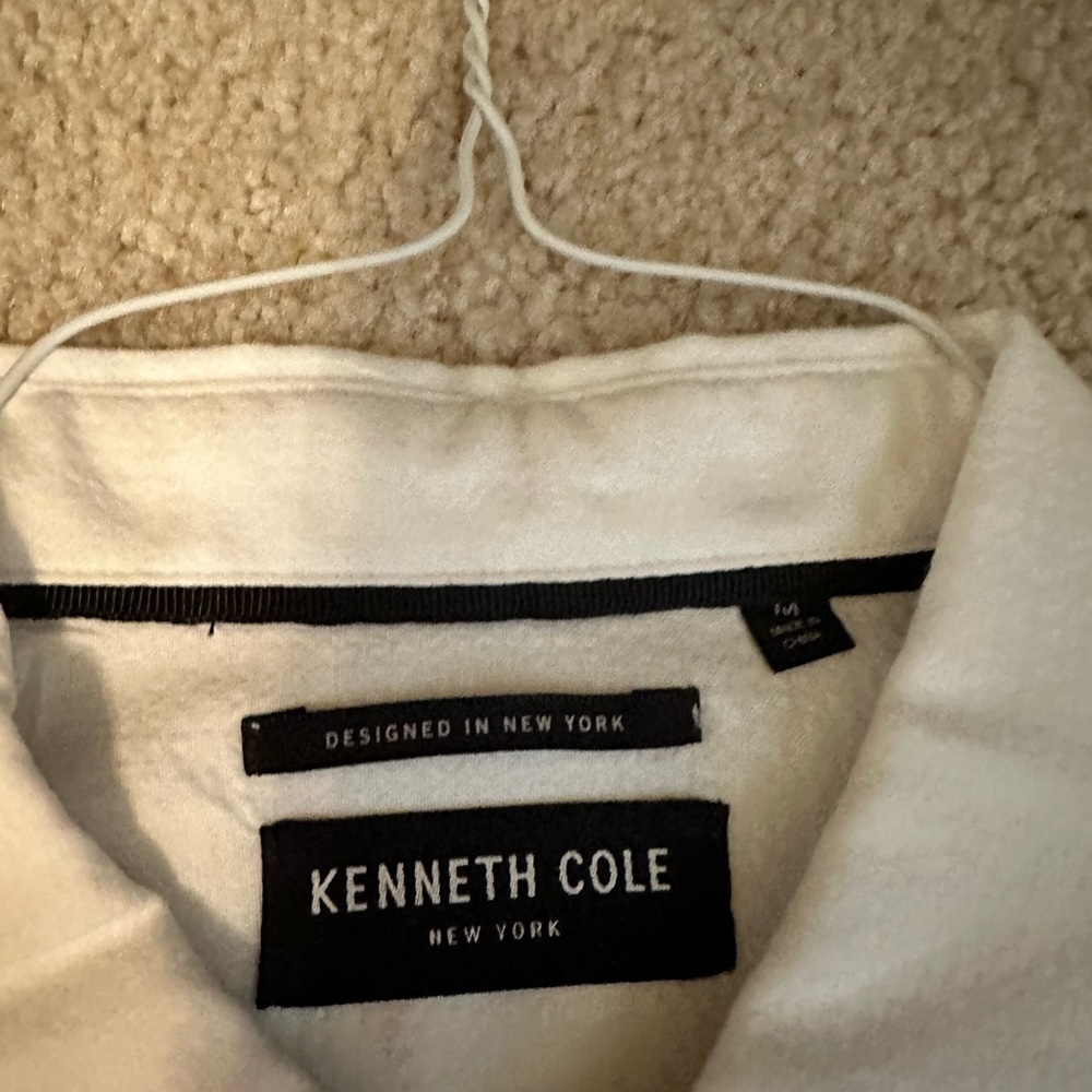 White short sleeved dress shirt.